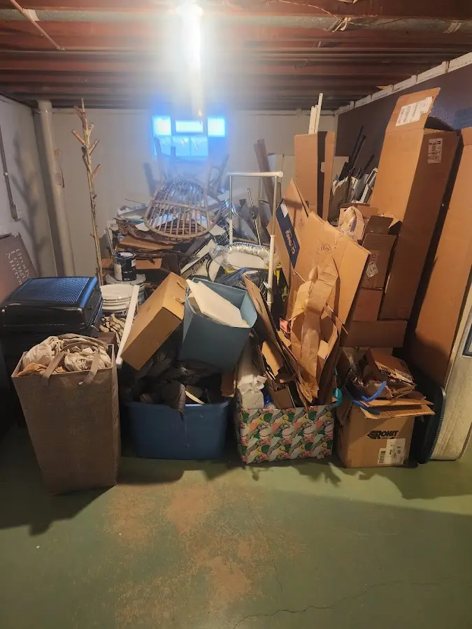 Roll-off dumpster container at job site for Construction Dumpster Rental in Collinsville